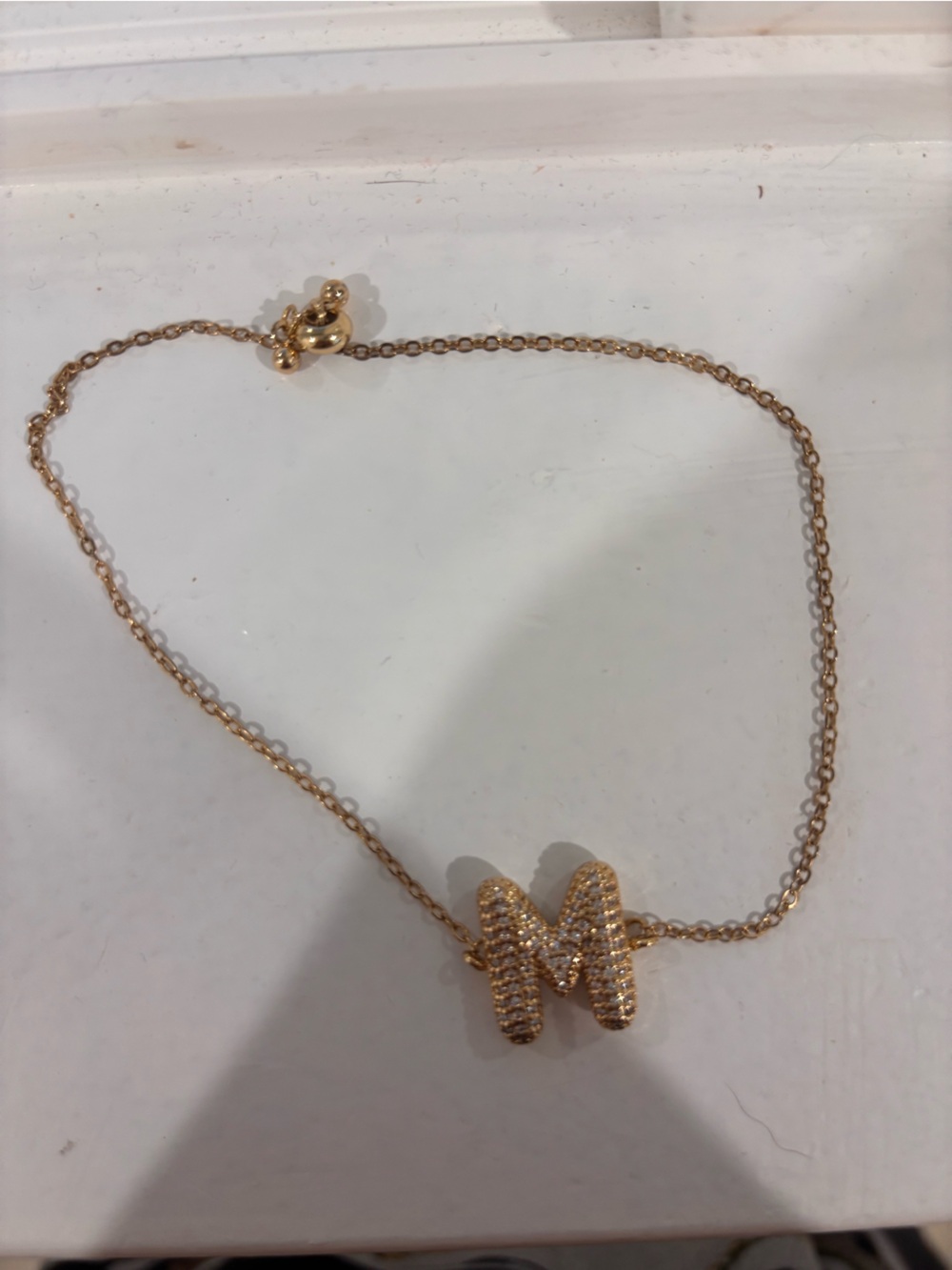 Gold adjustable M bracelet
